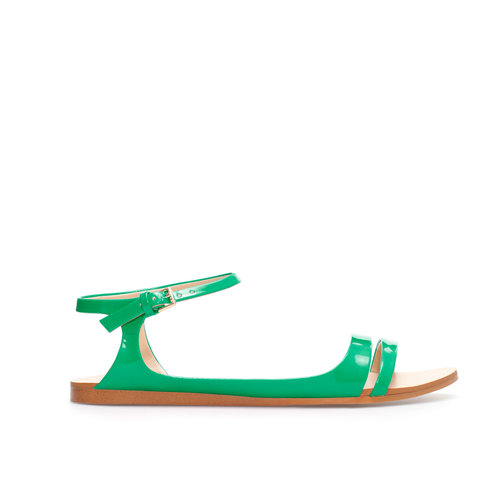 A grassy green like Zara's ankle-strap style ($40) evokes memories of lazy Summer afternoons.
A grassy green like Zara's ankle-strap style ($40) evokes memories of lazy Summer afternoons.