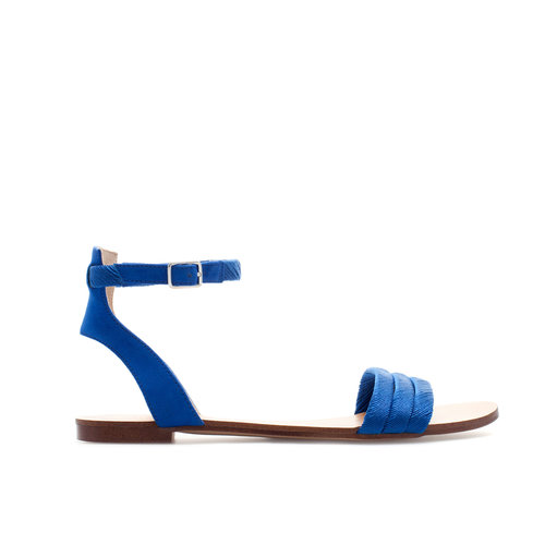 Try out a beautiful blue with Zara's satin-strap sandals ($40).
Try out a beautiful blue with Zara's satin-strap sandals ($40).