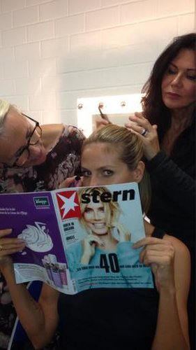 Heidi Klum checked out her German magazine article while getting glammed up.
Source: Twitter user heidiklum
Heidi Klum checked out her German magazine article while getting glammed up.
Source: Twitter user heidiklum
