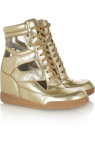 Make sure a wedge sneaker is in your wardrobe! We love Marc by Marc Jacobs's glitzy metallic cutout pair ($164, originally $328).
Make sure a wedge sneaker is in your wardrobe! We love Marc by Marc Jacobs's glitzy metallic cutout pair ($164, originally $328).