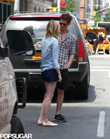 Andrew Garfield smiled at Emma Stone while they stood together.
Andrew Garfield smiled at Emma Stone while they stood together.