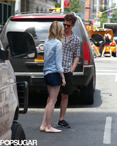 Andrew Garfield smiled at Emma Stone while they stood together.
Andrew Garfield smiled at Emma Stone while they stood together.
