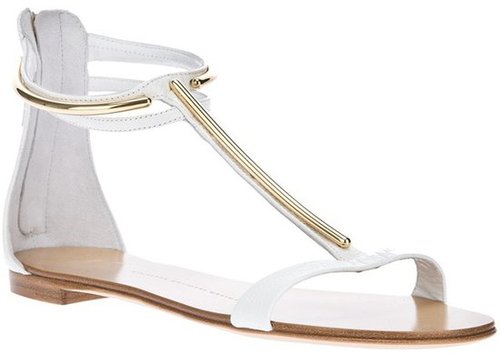 Keep it simple and refined, even if your wedding happens to be beachside. We love the gold T-bar detail of these breezy Giuseppe Zanotti white flat sandals ($791) — a pretty add-on that won't go unnoticed.
Keep it simple and refined, even if your wedding happens to be beachside. We love the gold T-bar detail of these breezy Giuseppe Zanotti white flat sandals ($791) — a pretty add-on that won't go unnoticed.