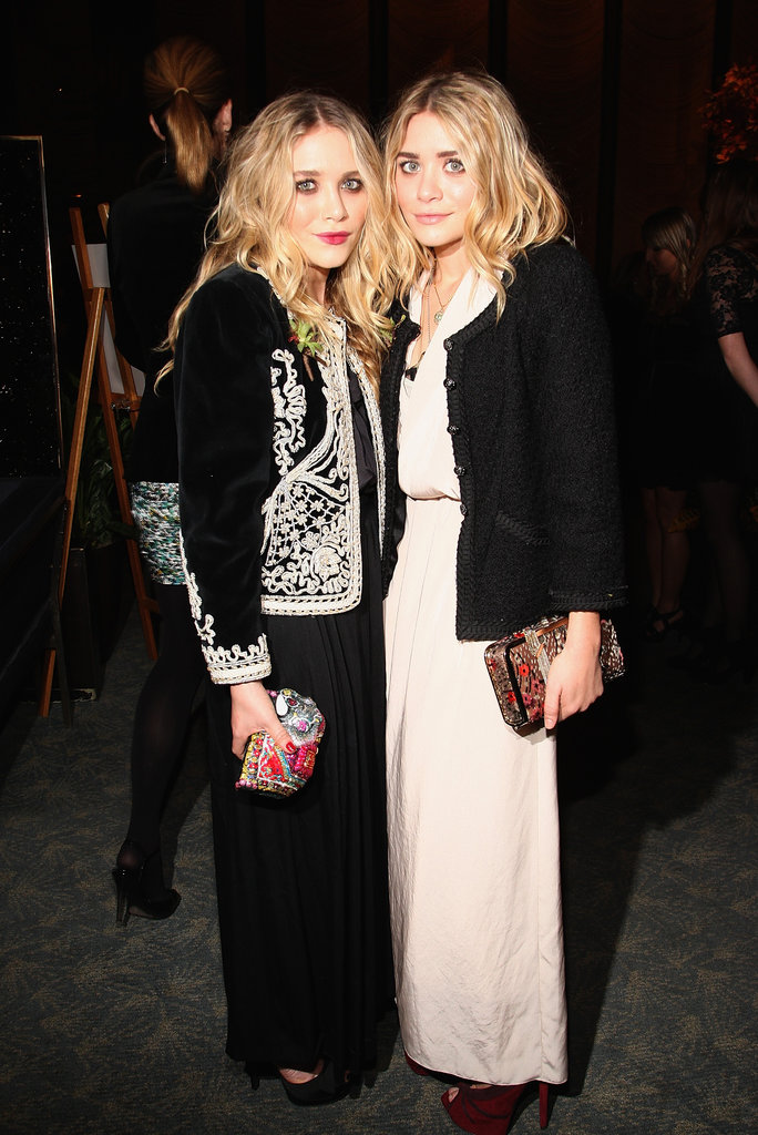 Twinning combo: At the 2009 CFDA new members reception, the darling duo polished their gorgeous gowns with ornate jackets.
Mary-Kate topped her black gown with a velour brocade jacket and colorful miniclutch.
Ashley contrasted her cream-colored crepe gown with a black tweed jacket and burgundy platforms.
Twinning combo: At the 2009 CFDA new members reception, the darling duo polished their gorgeous gowns with ornate jackets.
Mary-Kate topped her black gown with a velour brocade jacket and colorful miniclutch.
Ashley contrasted her cream-colored crepe gown with a black tweed jacket and burgundy platforms.