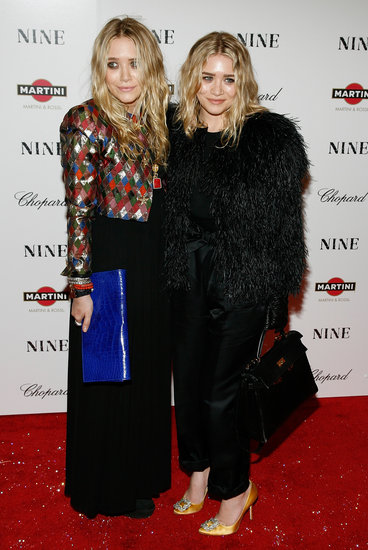 Twinning combo: Both girls wore eye-catching jackets and no-fuss beach waves for Nine's New York premiere in December 2009.
Mary-Kate brought major spunk in a shimmering harlequin jacket and cobalt leather clutch.
Ashley proved all-black is anything but boring in a cropped feathered jacket, silk trousers, and slick leather gloves.
Twinning combo: Both girls wore eye-catching jackets and no-fuss beach waves for Nine's New York premiere in December 2009.
Mary-Kate brought major spunk in a shimmering harlequin jacket and cobalt leather clutch.
Ashley proved all-black is anything but boring in a cropped feathered jacket, silk trousers, and slick leather gloves.