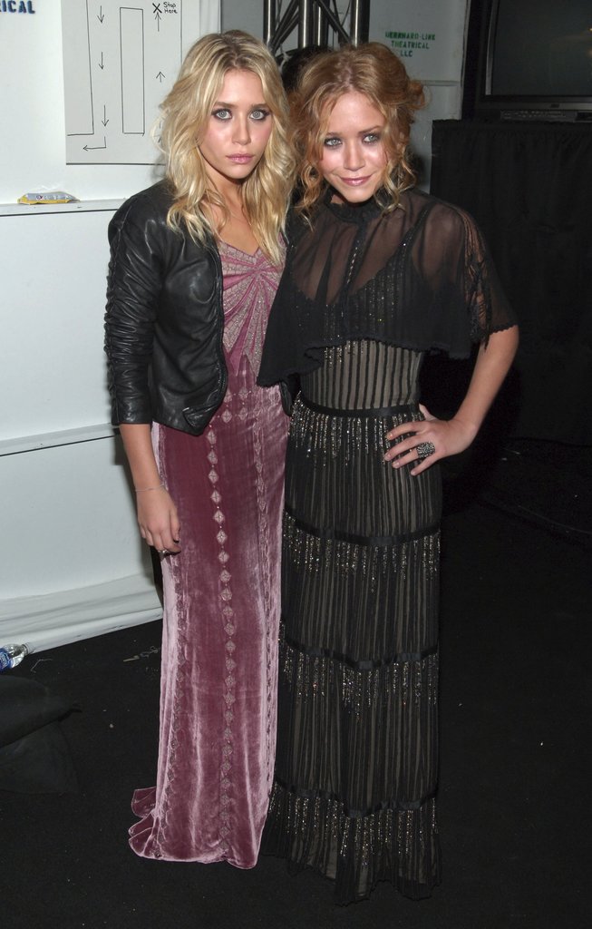 Twinning combo: During Fall 2006 NYFW season, the designing duo opted for decadent gowns and soft curls.
Ashley roughed up her blush velour gown, complete with sparkling bodice, with a cropped leather jacket.
Mary-Kate's sheer, tiered, and bead-embellished gown was absolutely stunning.
Twinning combo: During Fall 2006 NYFW season, the designing duo opted for decadent gowns and soft curls.
Ashley roughed up her blush velour gown, complete with sparkling bodice, with a cropped leather jacket.
Mary-Kate's sheer, tiered, and bead-embellished gown was absolutely stunning.