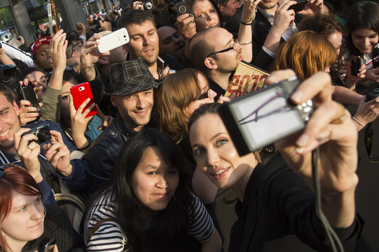 Angelina Jolie smiled for a photo while attending Brad Pitt's Paris premiere of World War Z in June 2013.
Angelina Jolie smiled for a photo while attending Brad Pitt's Paris premiere of World War Z in June 2013.