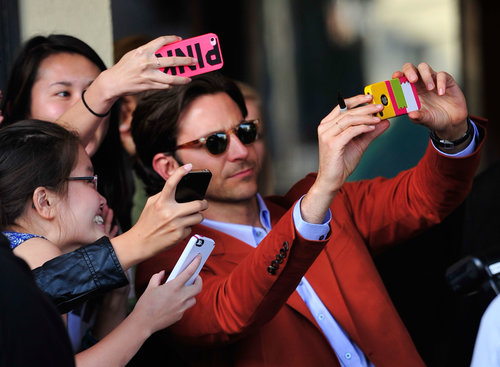 Bradley Cooper was more than comfortable surrounded by camera phones at the LA premiere of The Hangover III in May 2013.
Bradley Cooper was more than comfortable surrounded by camera phones at the LA premiere of The Hangover III in May 2013.