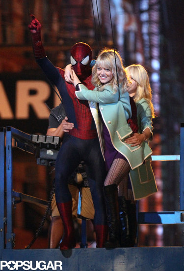 Andrew Garfield and a smiling Emma Stone swung into action on Monday night in New York City on the set of The Amazing Spider-Man 2.
Andrew Garfield and a smiling Emma Stone swung into action on Monday night in New York City on the set of The Amazing Spider-Man 2.