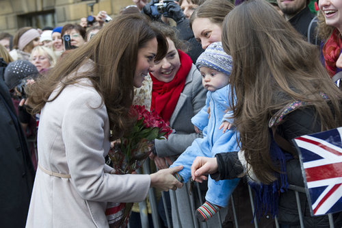 Kate Middleton was still keeping her pregnancy a secret in November 2012 when she was joined by Prince William to visit their namesake town, Cambridge.
Kate Middleton was still keeping her pregnancy a secret in November 2012 when she was joined by Prince William to visit their namesake town, Cambridge.