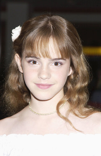 Brushed-out waves embellished with a flower comprised Emma's look for the 2002 premiere of Scooby-Doo in London.
Brushed-out waves embellished with a flower comprised Emma's look for the 2002 premiere of Scooby-Doo in London.
