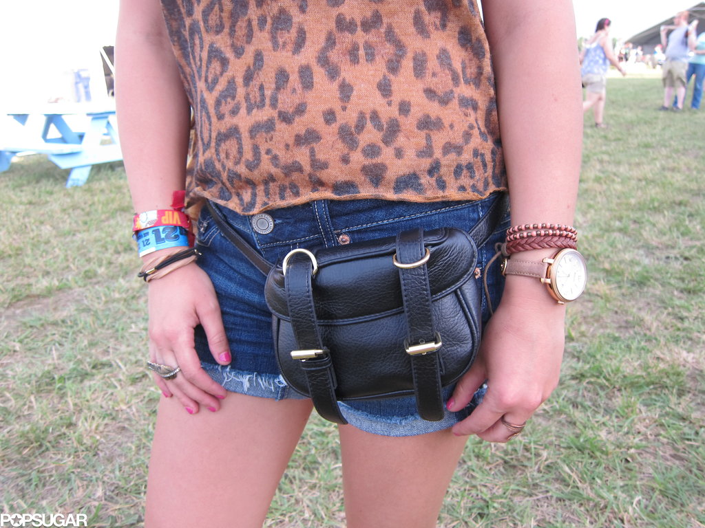Her sleek, black belt bag, mix of bracelets, and oversize-face watch supplied the leopard print with sleek undertones.
Her sleek, black belt bag, mix of bracelets, and oversize-face watch supplied the leopard print with sleek undertones.
