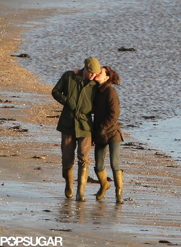 In January 2012, Kate Middleton gave Prince William a kiss while they strolled along a beach in Wales.
In January 2012, Kate Middleton gave Prince William a kiss while they strolled along a beach in Wales.