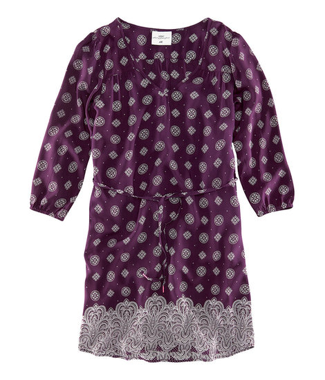 The relaxed fit of this H&M option ($30) reminds us of a Summer-friendly caftan, but the print and eggplant shade keep it professional enough for the office.
The relaxed fit of this H&M option ($30) reminds us of a Summer-friendly caftan, but the print and eggplant shade keep it professional enough for the office.