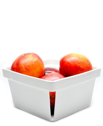 Plums, peaches, pears — this porcelain basket ($25) was made for holding your favorite fruits.
Plums, peaches, pears — this porcelain basket ($25) was made for holding your favorite fruits.