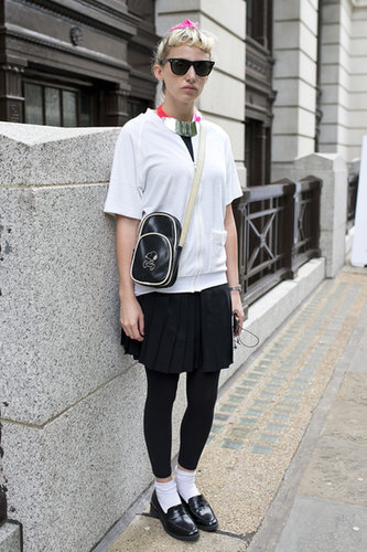 Preppy with spunk — i.e. loafers with socks, a statement necklace and cool-girl shades — makes this zip-up and skirt combo anything but average.
Preppy with spunk — i.e. loafers with socks, a statement necklace and cool-girl shades — makes this zip-up and skirt combo anything but average.