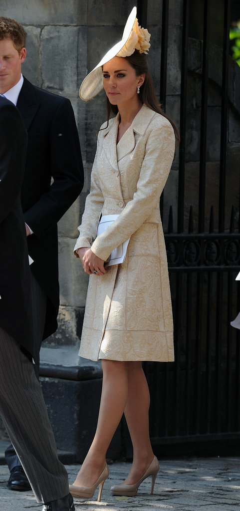 Kate Middleton was one sophisticated wedding guest in a printed coat and matching hat when Zara Phillips got married in Edinburgh in July 2011. To mimic Kate's style, top your wedding attire with a statement coat for the ceremony; then take it off for the reception.
Kate Middleton was one sophisticated wedding guest in a printed coat and matching hat when Zara Phillips got married in Edinburgh in July 2011. To mimic Kate's style, top your wedding attire with a statement coat for the ceremony; then take it off for the reception.