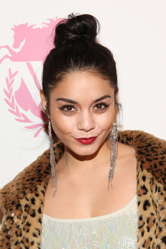 To dress up a topknot like Vanessa Hudgens, just add red lipstick and cat eyeliner.
To dress up a topknot like Vanessa Hudgens, just add red lipstick and cat eyeliner.