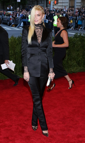 At the 2013 Met Gala in NYC, Jaime kept her bump classy in a black satin Topshop suit. We love that she showed just enough skin via a sheer black lace blouse. Do the same for your next nighttime affair.
At the 2013 Met Gala in NYC, Jaime kept her bump classy in a black satin Topshop suit. We love that she showed just enough skin via a sheer black lace blouse. Do the same for your next nighttime affair.