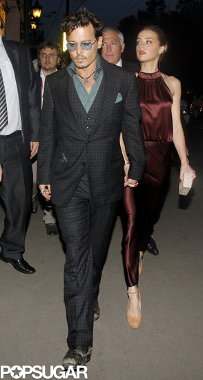 Johnny Depp and Amber Heard Reunite For PDA in Moscow Johnny Depp and Amber Heard Reunite For PDA in Moscow