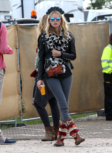 Even when dressing for nippy weather, Poppy Delevingne made sure her outfit felt festival-y, thanks to mirrored Topshop sunglasses and a floral wreath.
Even when dressing for nippy weather, Poppy Delevingne made sure her outfit felt festival-y, thanks to mirrored Topshop sunglasses and a floral wreath.