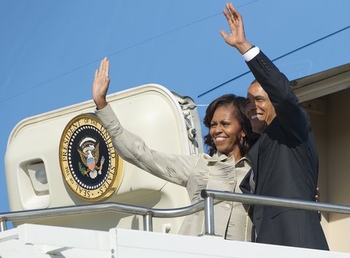 The Obamas waved from Air Force One as they left Pretoria, South Africa, in June.
The Obamas waved from Air Force One as they left Pretoria, South Africa, in June.
