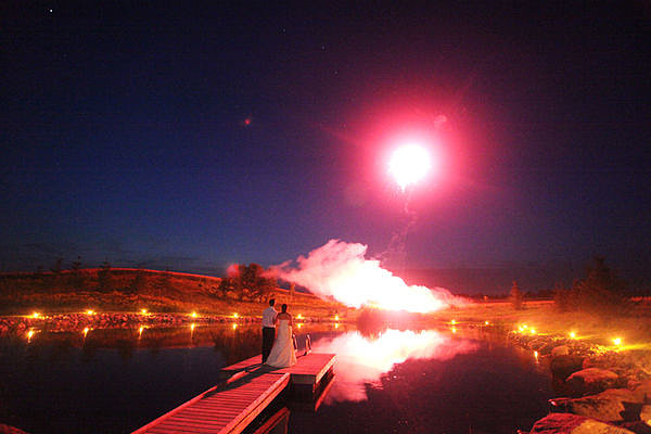 The dazzling display took place over the water.
Photo by A Simple Photograph via Style Me Pretty
The dazzling display took place over the water.
Photo by A Simple Photograph via Style Me Pretty