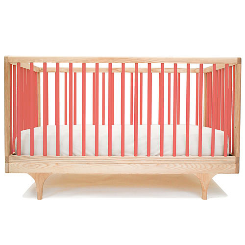 The contemporary yet classic Caravan Crib ($895) is sustainably constructed from solid maple and comes in red, yellow, green, and blue.
The contemporary yet classic Caravan Crib ($895) is sustainably constructed from solid maple and comes in red, yellow, green, and blue.