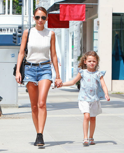 Instead of the usual denim cutoffs and tee pairing, look to Nicole Richie's unique duo. Tuck a sleeveless, mock-collar top into your shorts, then cinch your waist with a studded belt. Add aviator sunglasses and ankle boots for further flair.
Instead of the usual denim cutoffs and tee pairing, look to Nicole Richie's unique duo. Tuck a sleeveless, mock-collar top into your shorts, then cinch your waist with a studded belt. Add aviator sunglasses and ankle boots for further flair.