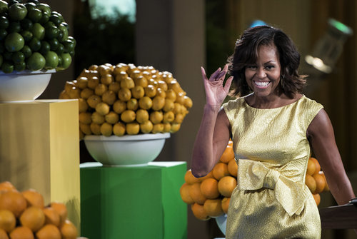 Michelle Obama shined in a gold metallic Michael Kors dress featuring an oversize bow at a kids' state dinner held at the White House.
Michelle Obama shined in a gold metallic Michael Kors dress featuring an oversize bow at a kids' state dinner held at the White House.