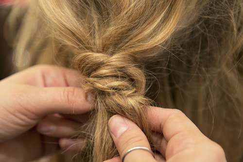 Wrap the braid around the base of the ponytail, and tuck the ends of the braid into the elastic for a seamless finish.
Wrap the braid around the base of the ponytail, and tuck the ends of the braid into the elastic for a seamless finish.
