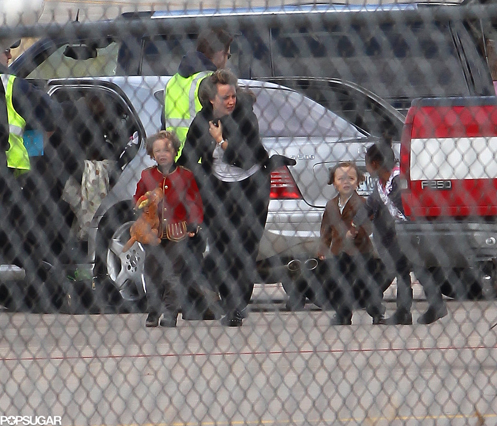 Shiloh Jolie-Pitt, Knox Jolie-Pitt, and Zahara Jolie-Pitt got a little help boarding a plane in Springfield, MO, in December 2010.
Shiloh Jolie-Pitt, Knox Jolie-Pitt, and Zahara Jolie-Pitt got a little help boarding a plane in Springfield, MO, in December 2010.