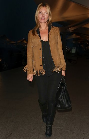 Oh, Kate Moss — always pairing the unexpected. Here she sets the classic piece off with a fringed suede jacket.
Photo courtesy of Saint Laurent
Oh, Kate Moss — always pairing the unexpected. Here she sets the classic piece off with a fringed suede jacket.
Photo courtesy of Saint Laurent