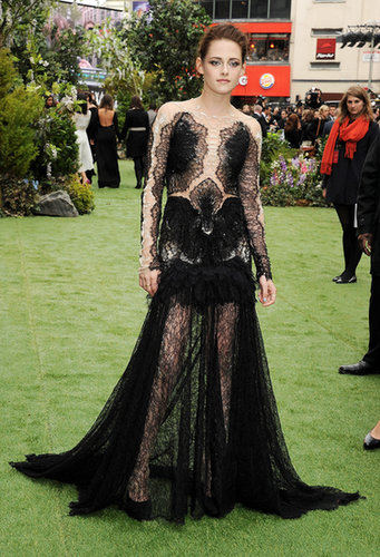 Stewart made a serious statement for the May 2012 premiere of Snow White and the Huntsman in London — she wore a gothic-inspired black lace Marchesa gown with a deceptively sheer bodice.
Stewart made a serious statement for the May 2012 premiere of Snow White and the Huntsman in London — she wore a gothic-inspired black lace Marchesa gown with a deceptively sheer bodice.