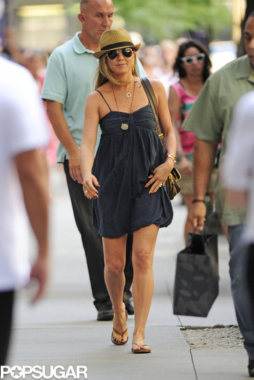 Jennifer Aniston smiled while walking to her set on July 16.
Jennifer Aniston smiled while walking to her set on July 16.