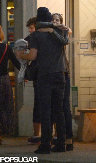 Robert Pattinson hugged a mystery girl during a night out in Toronto.
Robert Pattinson hugged a mystery girl during a night out in Toronto.
