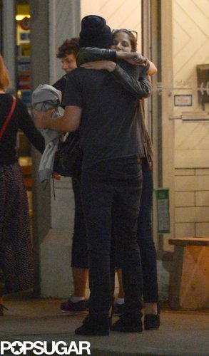 Robert Pattinson hugged a mystery girl during a night out in Toronto.
Robert Pattinson hugged a mystery girl during a night out in Toronto.