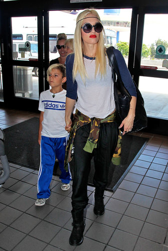 Gwen Stefani was funky in a baseball tee, round sunglasses, shiny black pants, and a camouflage sweater at LAX.
Gwen Stefani was funky in a baseball tee, round sunglasses, shiny black pants, and a camouflage sweater at LAX.