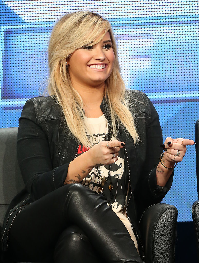 Demi Lovato joked around at the discussion panel for The X-Factor in LA.
Demi Lovato joked around at the discussion panel for The X-Factor in LA.