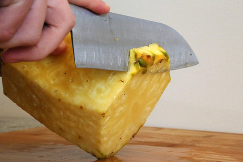Trim off any remaining skin. Also, use a melon baller to cut out the tough brown eyes in the flesh of the fruit.
Trim off any remaining skin. Also, use a melon baller to cut out the tough brown eyes in the flesh of the fruit.