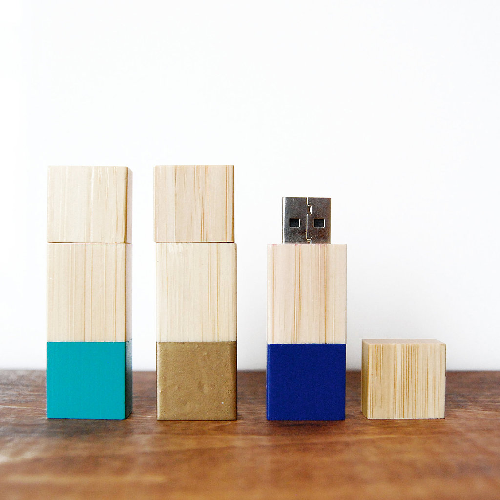 This isn't your average flash drive. Keep files safe with this wooden USB stick ($34) that comes in colorblock for even more style.
This isn't your average flash drive. Keep files safe with this wooden USB stick ($34) that comes in colorblock for even more style.
