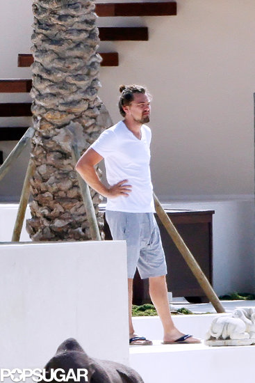 Leonardo DiCaprio wore his hair in a bun in Ibiza.
Leonardo DiCaprio wore his hair in a bun in Ibiza.