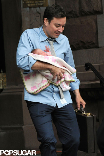 Jimmy Fallon stepped out with his newborn daughter, Winnie, in NYC on Thursday.
Jimmy Fallon stepped out with his newborn daughter, Winnie, in NYC on Thursday.