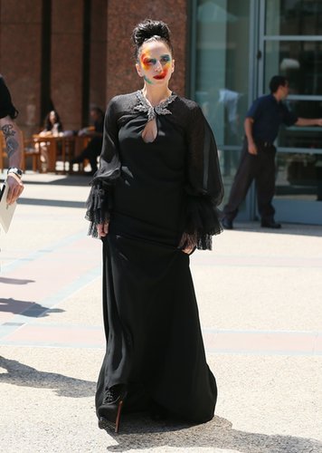 Most recently, Mother Monster was spotted wearing all black and sporting the same multicolored, smeared makeup that is featured on the cover of her new album, Artpop.
Most recently, Mother Monster was spotted wearing all black and sporting the same multicolored, smeared makeup that is featured on the cover of her new album, Artpop.
