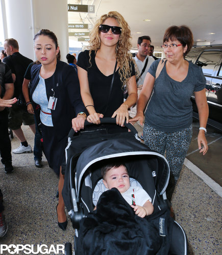 Shakira pushed her son, Milan, in a stroller when she arrived at LAX.
Shakira pushed her son, Milan, in a stroller when she arrived at LAX.