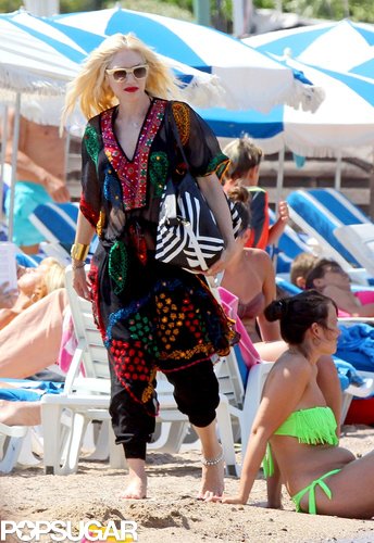 Gwen Stefani took her signature style to the beaches in the South of France with this colorful caftan and harem pant look.
Gwen Stefani took her signature style to the beaches in the South of France with this colorful caftan and harem pant look.