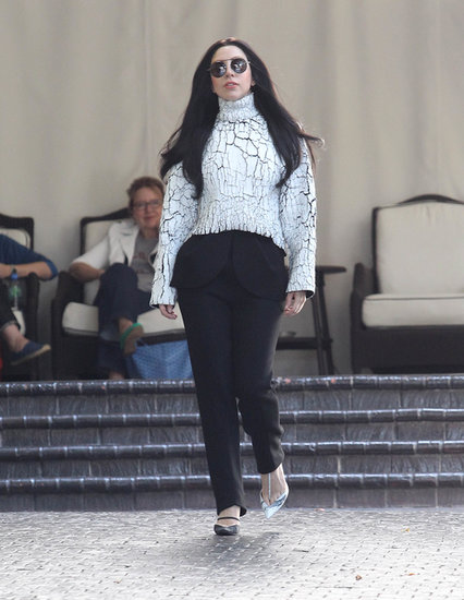 It wouldn't be hard to confuse this shot of Lady Gaga with a snap from the Fall 2013 Balenciaga collection — the artist chose a crackled sweatshirt top and peplum-trimmed pants from the line for an appearance in LA.
It wouldn't be hard to confuse this shot of Lady Gaga with a snap from the Fall 2013 Balenciaga collection — the artist chose a crackled sweatshirt top and peplum-trimmed pants from the line for an appearance in LA.