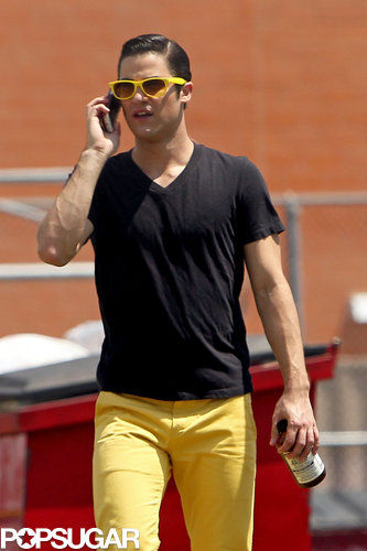 Darren Criss took a cell phone call while on set.
Darren Criss took a cell phone call while on set.