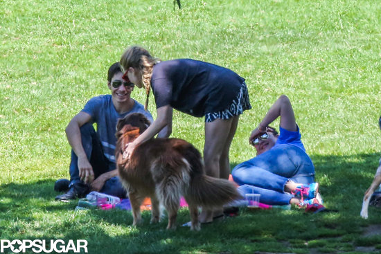Amanda Seyfried pet her dog while relaxing in the shade with Justin Long.
Amanda Seyfried pet her dog while relaxing in the shade with Justin Long.