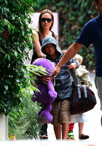 Pax carried his giant stuffed animal as he walked with Angelina Jolie.
Pax carried his giant stuffed animal as he walked with Angelina Jolie.